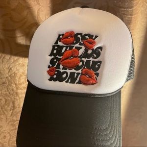 A Cool Trucker Hat. That has never been worn. Pu$$Y builds strong Bones.